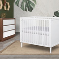 632-WHT Lucas Mini Modern Crib With Rounded Spindles Room Shot 05