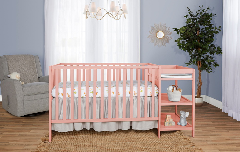 679-DPINK Synergy 5-in-1 Convertible Crib and Changer Room Shot.jpg